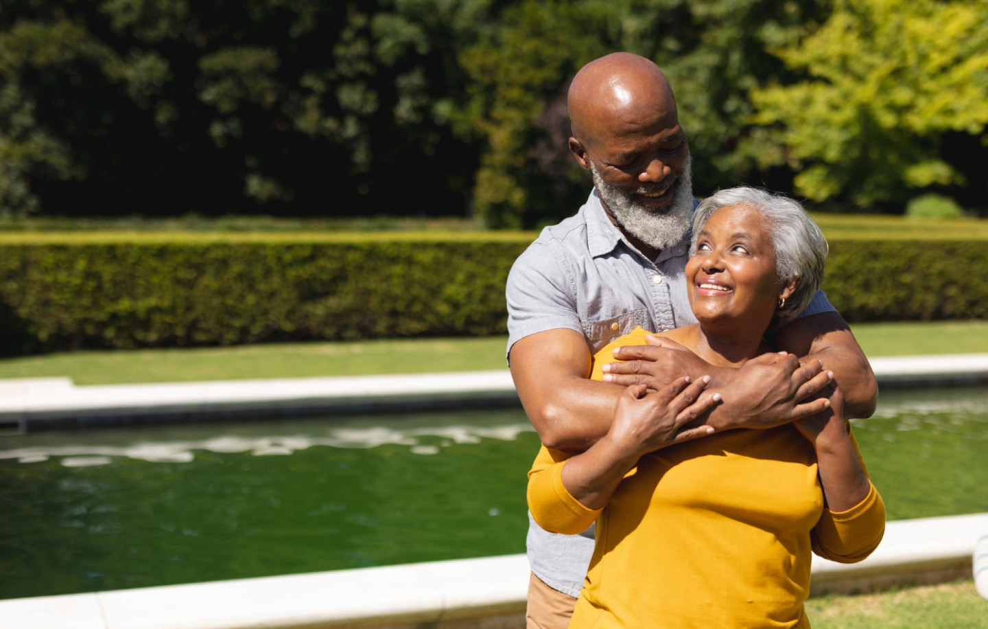 An elderly couple spending time together outdoors